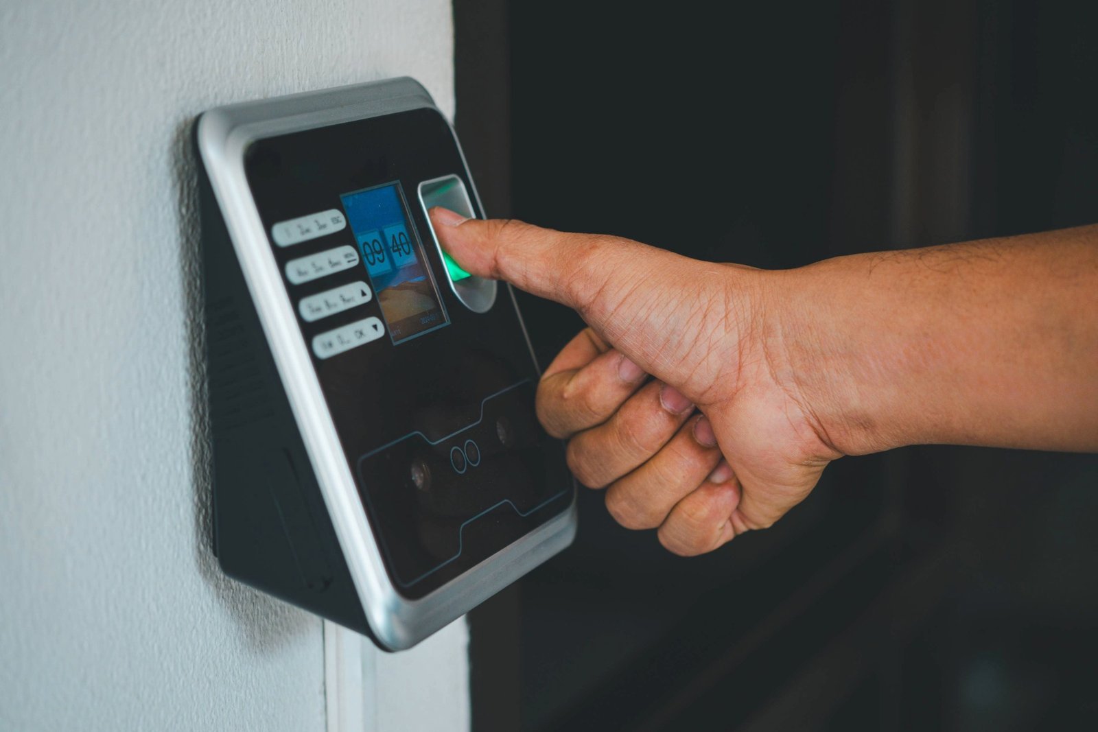a-person-is-using-a-fingerprint-reader-to-access-a-2025-02-15-08-58-49-utc