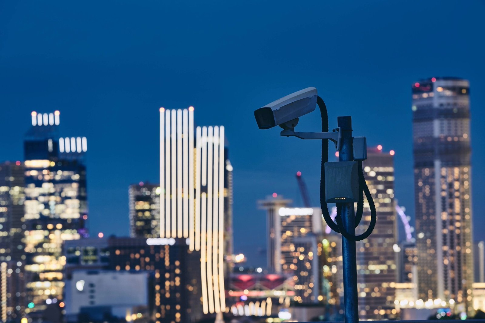 security-camera-against-illuminated-urban-skyline-2025-02-16-11-01-50-utc