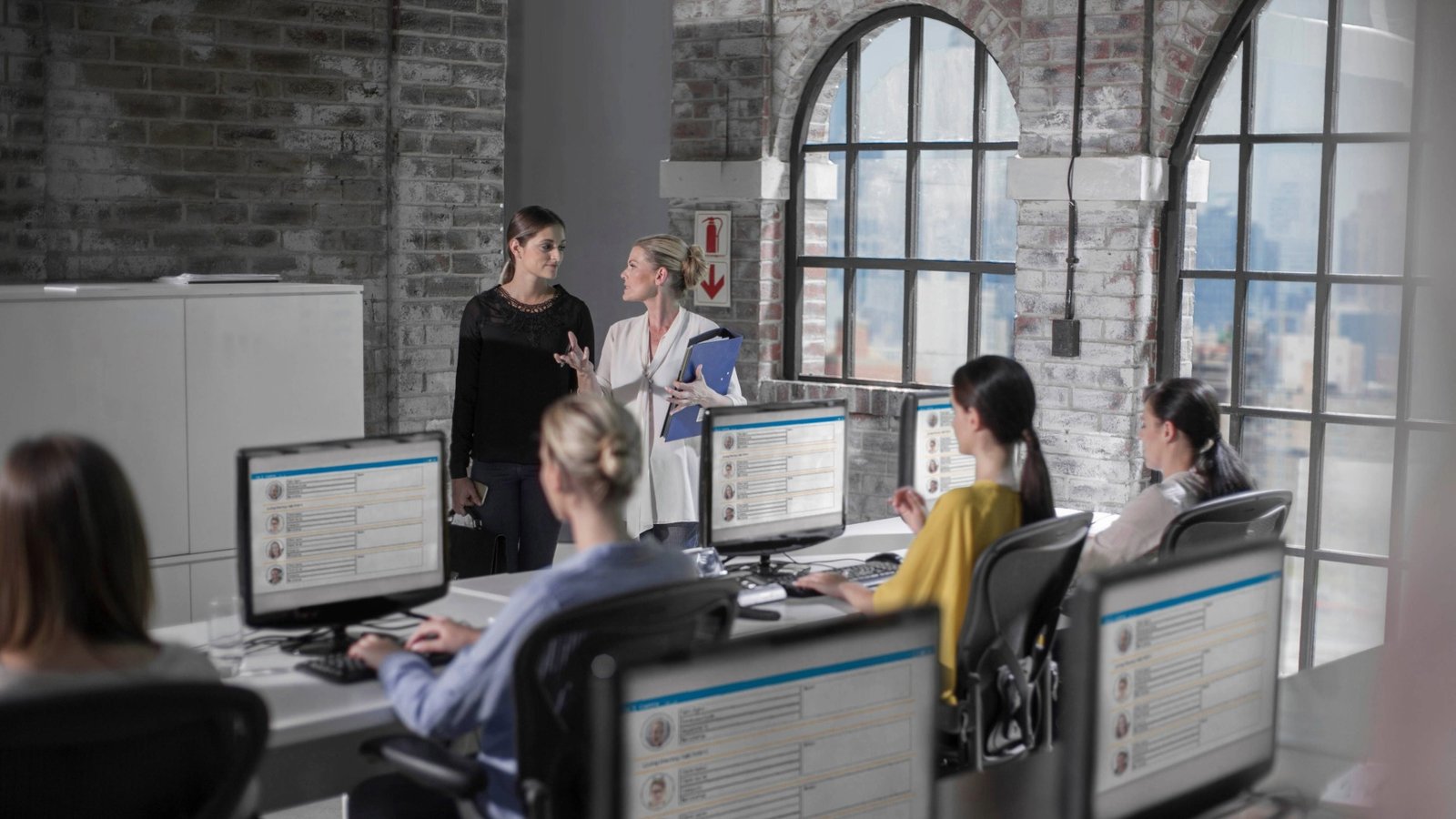 female-workers-at-training-presentation-in-call-ce-2025-04-04-05-37-47-utc